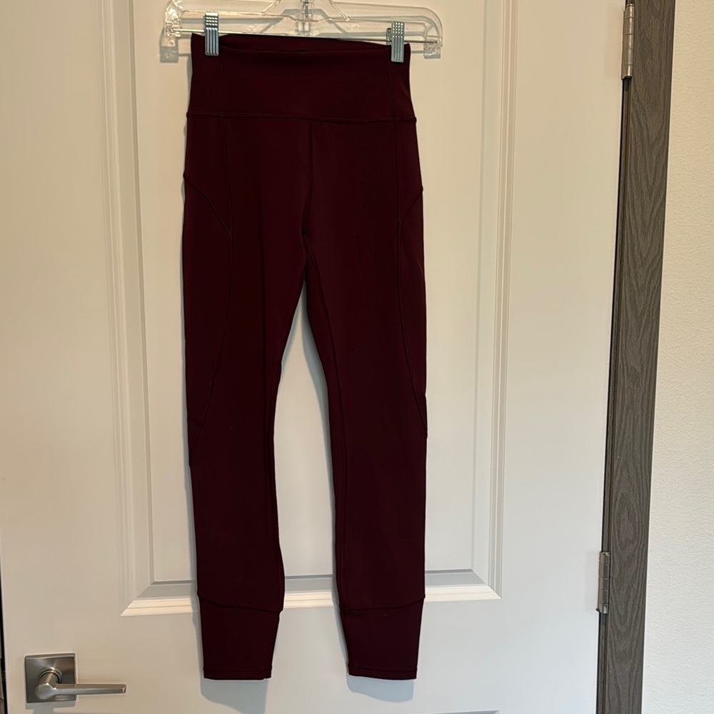 Lululemon High-waisted Burgundy Leggings. 7/8 length. Size 4. Pre-owned